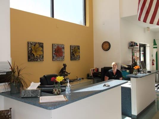 SpringStone staff manage the school in an open concept office, built for parent involvement and open communication