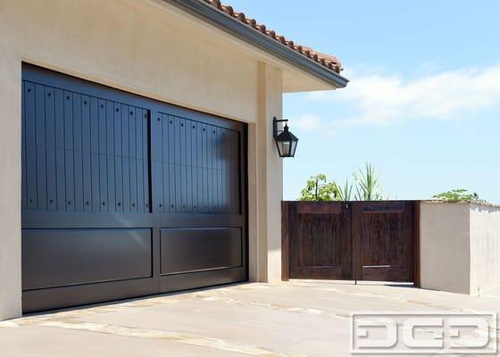 Spanish Mediterranean Style Garage Doors and Garden Gates. Custom designed and handcrafted in Orange County, California