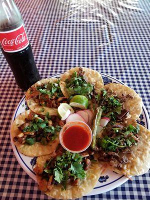 6 Tacos, Asada & Al Pastor minus onions, asked for cheese and they melted it right to the tortilla with a large coke. About $15