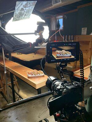 Capturing candid moments behind the scenes at Andy's Neighborhood Canteen video shoot - where creativity meets culinary delight.