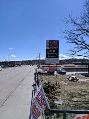 From 90th Street, make a right after this sign and you'll be right at the shop.