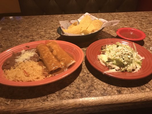 2 enchiladas with beans & rice with side of the Tastaguac