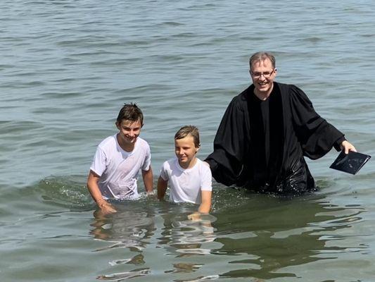 Open ocean baptism with Father Gray