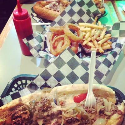 Our 12 inch Philly Sandwiches and fries and onion rings