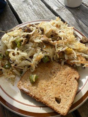 Loaded hash browns with toast.