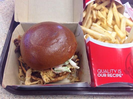 Pulled pork bbq cheeseburger and fries. Good combo.