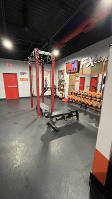 FX Zone. This area provides for supplemental exercise with dumbbells, kettle bells, ropes, medicine balls and the like.