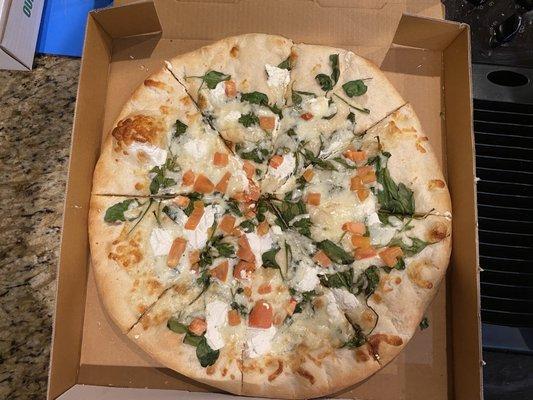 White pizza with lots of dough & not well covered toppings.