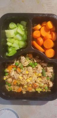 Chicken fried rice with broccoli cuts & sliced carrots