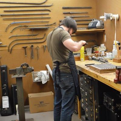 Full Repair Service Facilities: woodwind repair, brass repair, guitar repair, piano restoration & tuning services