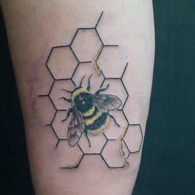 Bee and honeycomb done by Jeremy Jensen