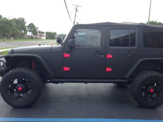 Matte black wrap and pink accents, boom!