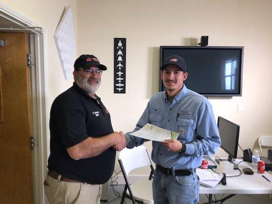 Shawn Brown receiving his Emergency Medical Responder (EMR) certification.