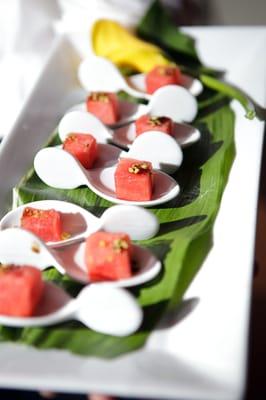 Watermelon Bites with a balsamic reduction and pistachio dust