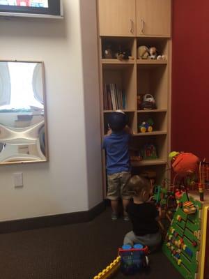 Playroom for the little one with toys, books and a tv.