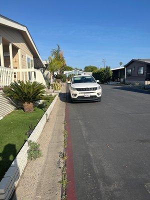 Here's a car clearly parked in the red, and yet the tow company would not come!