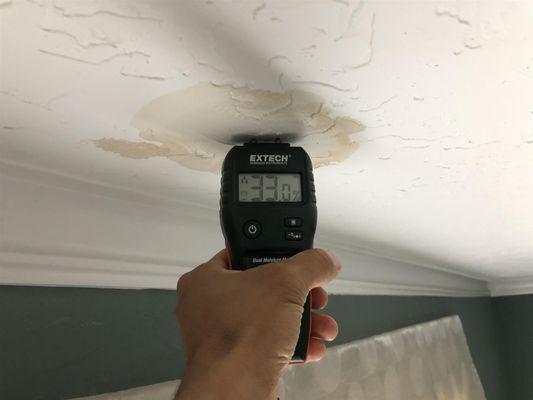 moisture meter on ceiling leak