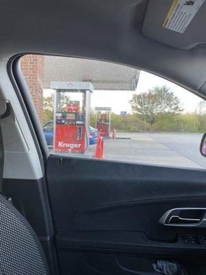 Looking at some of the gas pumps at the gas station.