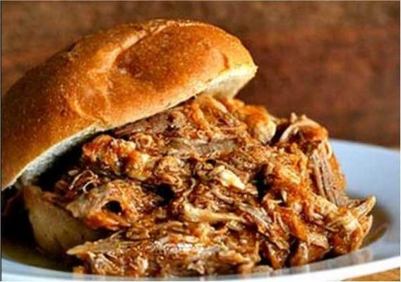 18 hour slow smoked pulled pork served with three types of homemade BBQ sauces