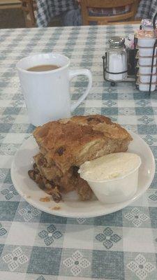 Bread pudding and whipped butter as breakfast dessert.