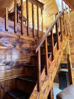 A-frame Cabin 6 stairway to lofted bedroom.