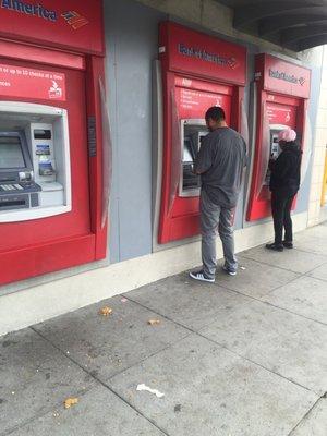 Three ATM machines outside jt