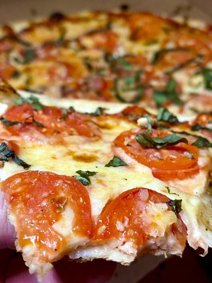 A slice of Fresh Tomato & Basil pie - great! It delivers!