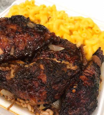 Jerk chicken, mac n cheese, and red beans and rice.