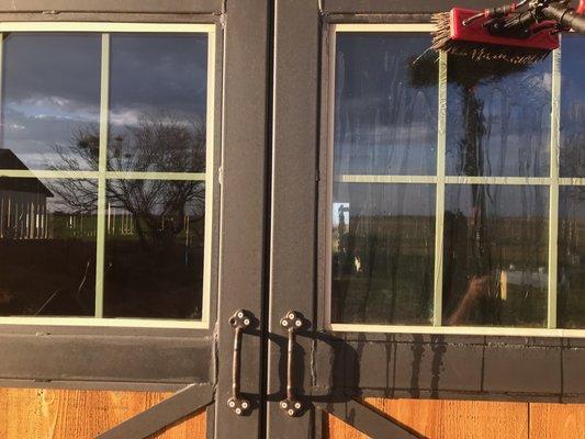 Boar Bristle Brush on barn door window