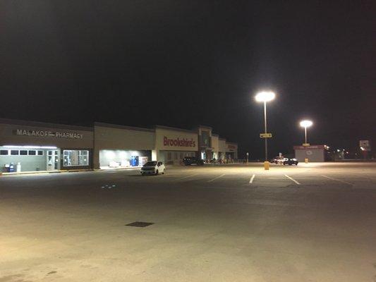 Front of store, from the gasoline pumps at night