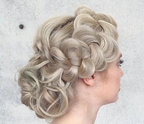 Wedding braids and  up dos . Our hair styling team is phenomenal