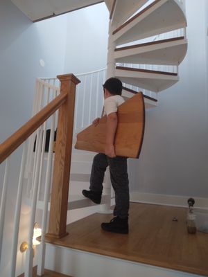 My son helping me button up the spiral staircase in point Judith.