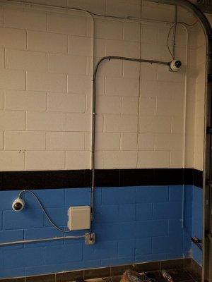 Commercial Security Camera Install with Conduit for a nice look. With a wall mounted termination box.