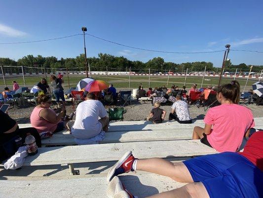 Speedway overlooking people not wearing masks