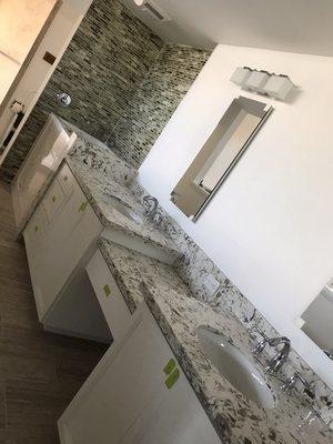 Bathroom complete remodel. Double sinks faucets