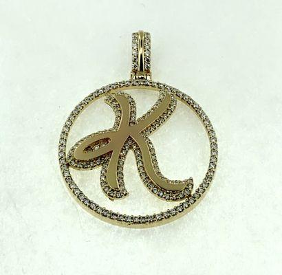 Initial diamond pendants by Sixto III