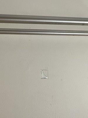 Unrepaired sample hole in the middle of the wall