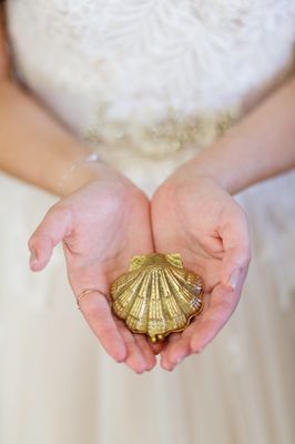 bride with her ring box