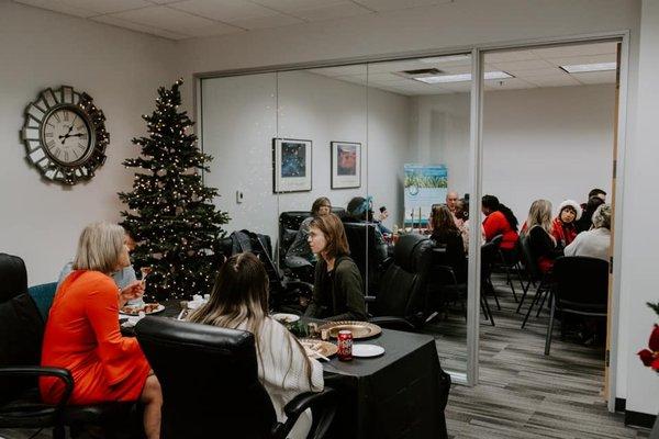 Enjoying a Christmas lunch in our office with some staff!