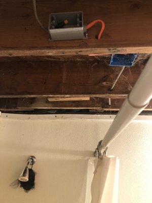 Exposed wires above my shower for over a week after the unit above me flooded