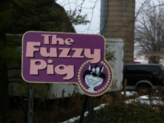 Their sign outside.  Apparently THE FUZY CAT was a name of one of their beloved cats.