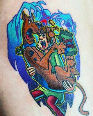 This is my Scooby Doo Tattoo. I told him a rough concept and he really captured exactly what I wanted!