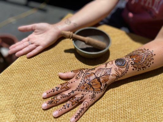 Henna session outdoors at client home