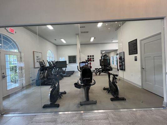 View of the gym from inside the leasing office