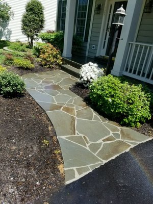 Broken flagstone walkway