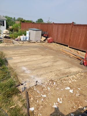 Concrete pad demolition under shed