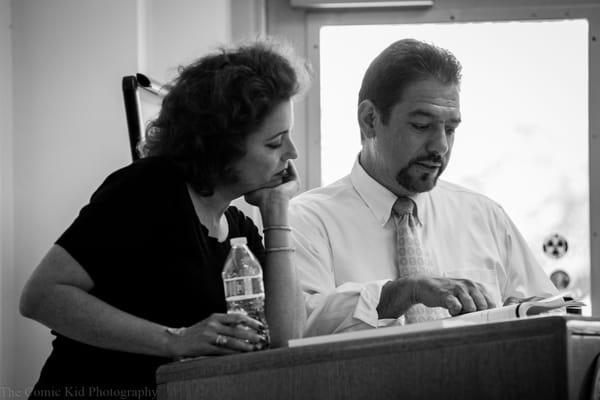 Vox Optima Executive Director Merritt Allen (left) consults with Vox media trainer Floyd Vasquez during our training session for NMDHSEM.