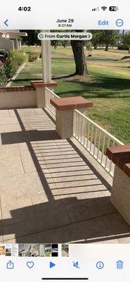 This is our back patio which was nothing but a concrete slab.New stucco pillars and railings were installed by Leonard and Son.