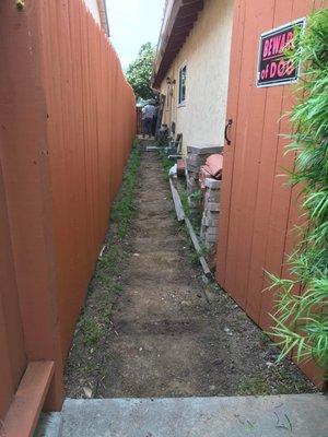 Before pictures of paver hallway