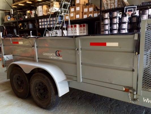 Some of our materials and one of our trailers inside the shop.